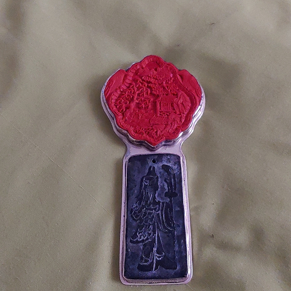 Cinnabar and slate pendant